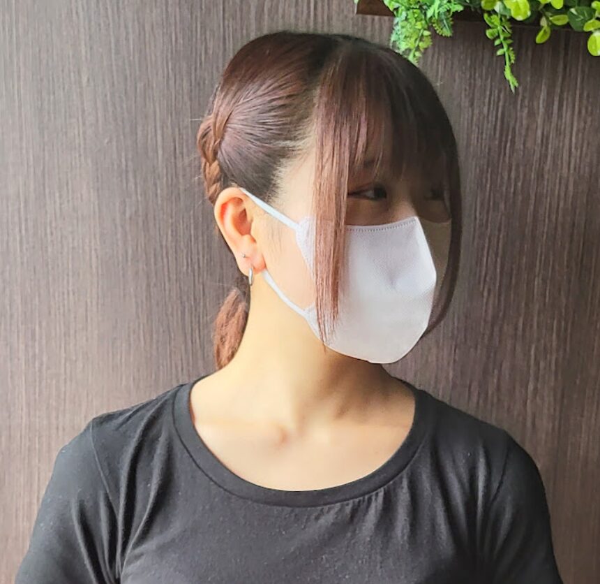 a woman wearing a mask